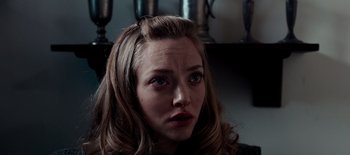 Movie still from “First Reformed” (2017), directed by Paul Schrader – A person with long blonde hair; Close Up shot, Over the shoulder angle