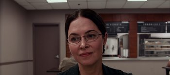 Movie still from “First Reformed” (2017), directed by Paul Schrader – A person wearing glasses; Close Up shot, Over the shoulder angle