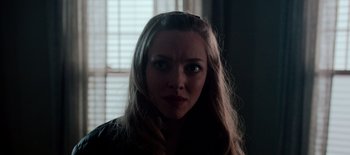 Movie still from “First Reformed” (2017), directed by Paul Schrader – A person with long blonde hair; Close Up shot, Over the shoulder angle