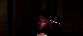 Movie still from “First Reformed” (2017), directed by Paul Schrader – A man is holding a stick in a dark room; Close Up shot, Low angle