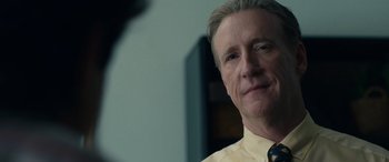 Movie still from “Flamin' Hot” (2023), directed by Eva Longoria – A person wearing a shirt and a tie; Close Up shot, Over the shoulder angle