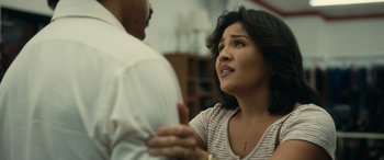 Movie still from “Flamin' Hot” (2023), directed by Eva Longoria – A man and a woman talking to each other; Close Up shot, Over the shoulder angle