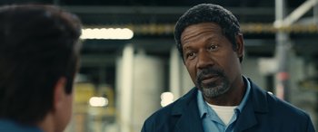 Movie still from “Flamin' Hot” (2023), directed by Eva Longoria – A person wearing a jacket; Close Up shot, Low angle