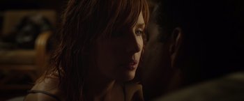 Movie still from “Flight” (2012), directed by Robert Zemeckis – A woman with red hair; Close Up shot, Low angle