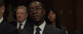 Movie still from “Flight” (2012), directed by Robert Zemeckis – A man in a suit and a tie; Close Up shot, Over the shoulder angle