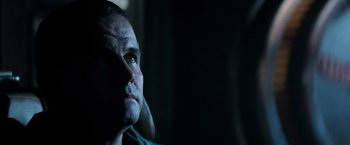 Movie still from “Alien” (1979), directed by Ridley Scott – A person looking up at the sky; Close Up shot, Low angle