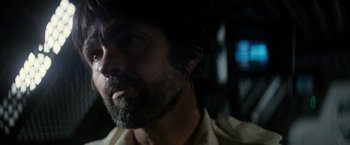 Movie still from “Alien” (1979), directed by Ridley Scott – A person with a beard; Close Up shot, Low angle