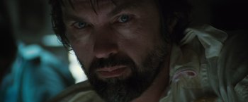 Movie still from “Alien” (1979), directed by Ridley Scott – A person with a beard; Extreme Close Up shot, Low angle