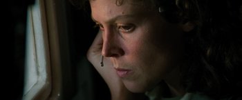 Movie still from “Alien” (1979), directed by Ridley Scott – A person with a cigarette in her mouth; Close Up shot, Low angle