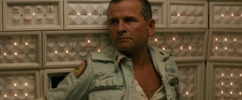 Movie still from “Alien” (1979), directed by Ridley Scott – A person wearing a jacket; Close Up shot, Low angle