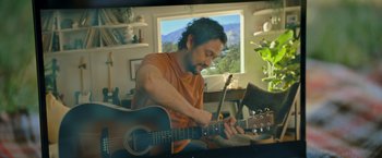 Movie still from “Flora and Son” (2023), directed by John Carney – Medium shot, Low angle