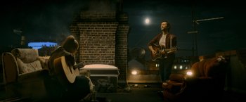 Movie still from “Flora and Son” (2023), directed by John Carney – Wide shot, High angle