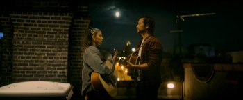 Movie still from “Flora and Son” (2023), directed by John Carney – Medium shot, Low angle