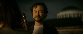 Movie still from “Flora and Son” (2023), directed by John Carney – A person holding a guitar; Close Up shot, Over the shoulder angle