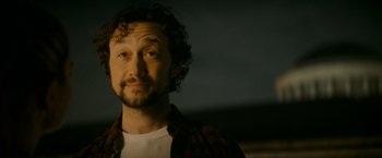 Movie still from “Flora and Son” (2023), directed by John Carney – A person wearing a shirt; Close Up shot, Low angle