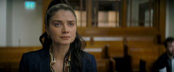 Movie still from “Flora and Son” (2023), directed by John Carney – A person with long hair; Close Up shot, High angle