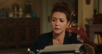 Movie still from “Flora & Ulysses” (2021), directed by Lena Khan – A woman sitting in front of an old fashioned typewriter; Close Up shot, Over the shoulder angle