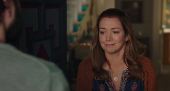 Movie still from “Flora & Ulysses” (2021), directed by Lena Khan – A person wearing a necklace; Close Up shot, Over the shoulder angle