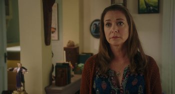 Movie still from “Flora & Ulysses” (2021), directed by Lena Khan – A person wearing a sweater; Close Up shot, Over the shoulder angle