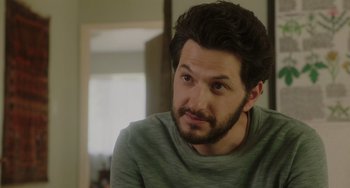 Movie still from “Flora & Ulysses” (2021), directed by Lena Khan – A person wearing a green shirt; Close Up shot, Over the shoulder angle