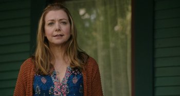 Movie still from “Flora & Ulysses” (2021), directed by Lena Khan – A person standing near a window; Close Up shot, Over the shoulder angle