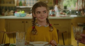 Movie still from “Flora & Ulysses” (2021), directed by Lena Khan – A girl sitting at a table with a bowl of soup; Close Up shot, Over the shoulder angle
