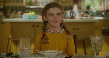 Movie still from “Flora & Ulysses” (2021), directed by Lena Khan – A girl sitting at a table with a bowl of soup; Close Up shot, Over the shoulder angle