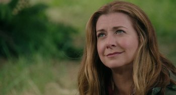 Movie still from “Flora & Ulysses” (2021), directed by Lena Khan – A person with long brown hair; Close Up shot, Over the shoulder angle