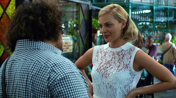 Movie still from “Focus” (2015), directed by John Requa – A man and a woman talking to each other outside; Medium shot, Over the shoulder angle