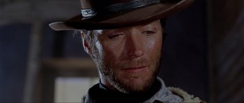 Movie still from “For a Few Dollars More” (1965), directed by Sergio Leone – A person wearing a hat; Close Up shot, Low angle