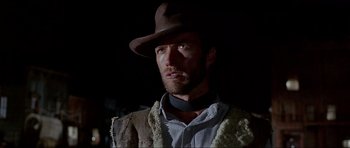 Movie still from “For a Few Dollars More” (1965), directed by Sergio Leone – A person wearing a hat; Close Up shot, Low angle