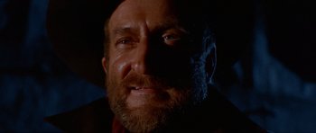 Movie still from “For a Few Dollars More” (1965), directed by Sergio Leone – A person with a beard; Close Up shot, Low angle