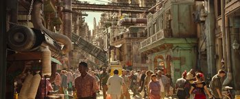 Movie still from “Alita: Battle Angel” (2019), directed by Robert Rodriguez – A crowd of people walking down a street; Extreme Wide shot, High angle