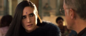 Movie still from “Alita: Battle Angel” (2019), directed by Robert Rodriguez – A person wearing a fur coat; Close Up shot, Over the shoulder angle