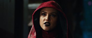 Movie still from “Alita: Battle Angel” (2019), directed by Robert Rodriguez – A person wearing a hood; Close Up shot, Over the shoulder angle