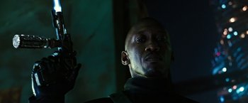 Movie still from “Alita: Battle Angel” (2019), directed by Robert Rodriguez – A person with a cell phone; Close Up shot, Low angle