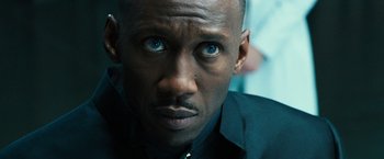 Movie still from “Alita: Battle Angel” (2019), directed by Robert Rodriguez – A person with blue eyes; Close Up shot, Over the shoulder angle