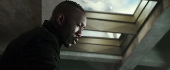 Movie still from “Alita: Battle Angel” (2019), directed by Robert Rodriguez – A person looking at the camera; Close Up shot, Low angle