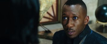 Movie still from “Alita: Battle Angel” (2019), directed by Robert Rodriguez – A person with blue eyes; Close Up shot, Over the shoulder angle