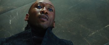 Movie still from “Alita: Battle Angel” (2019), directed by Robert Rodriguez – A person with blue eyes; Close Up shot, Overhead angle