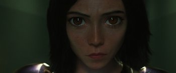 Movie still from “Alita: Battle Angel” (2019), directed by Robert Rodriguez – A woman's face with brown eyes; Extreme Close Up shot, High angle
