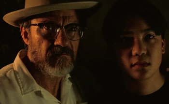 Movie still from “From Dusk Till Dawn” (1996), directed by Robert Rodriguez – An older man and a young woman are looking at the camera; Close Up shot, Low angle