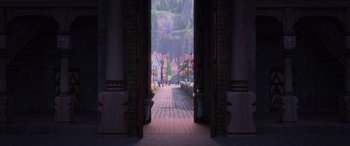Movie still from “Frozen” (2013), directed by Jennifer Lee – An open door leading to a street with trees and buildings in the background; Extreme Wide shot, Over the shoulder angle