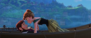 Movie still from “Frozen” (2013), directed by Jennifer Lee – A woman in a dress is in a small boat; Medium shot, Over the shoulder angle