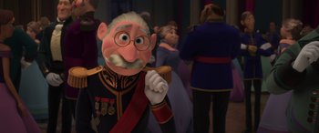 Movie still from “Frozen” (2013), directed by Jennifer Lee – A man with a beard and glasses is holding a wooden stick; Medium shot, Over the shoulder angle