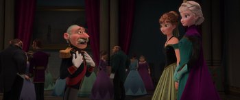 Movie still from “Frozen” (2013), directed by Jennifer Lee – A couple of people standing next to each other in a room; Medium shot, Over the shoulder angle
