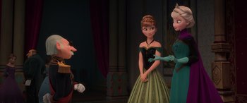Movie still from “Frozen” (2013), directed by Jennifer Lee – A group of people standing next to each other in a room; Medium shot, Over the shoulder angle