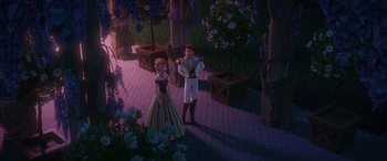 Movie still from “Frozen” (2013), directed by Jennifer Lee – A man and a woman standing next to each other in front of trees; Wide shot, Over the shoulder angle