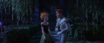 Movie still from “Frozen” (2013), directed by Jennifer Lee – A man and a woman standing next to each other; Medium shot, Over the shoulder angle