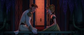 Movie still from “Frozen” (2013), directed by Jennifer Lee – A man and a woman sitting next to each other on a bench; Medium shot, Over the shoulder angle
